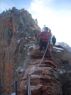 210 84p. Zion National Park - Angels Landing hike - Adam using chains