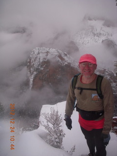 Zion National Park - cloudy, foggy Observation Point hike - Adam at the top