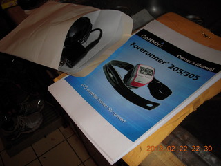 big-paper printout of the manual for Garmin Forerunner 205