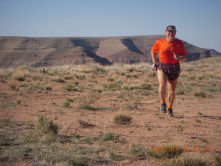 109 87y. Adam running at Grand Gulch (tripod and timer)