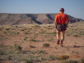 110 87y. Adam running at Grand Gulch (tripod and timer)