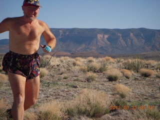 115 87y. Adam running at Grand Gulch (tripod and timer)