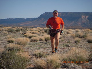 119 87y. Adam running at Grand Gulch (tripod and timer)