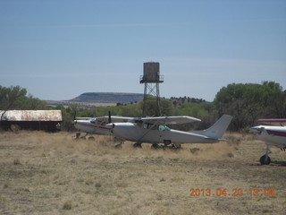 80 88l. Double Circle Ranch at Eagle Creek - water tower with photographer