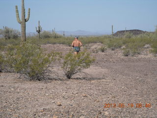 Adam running at Windmill airstrip (tripod, back)