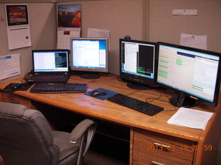 four monitors on my desk at Clear Demand