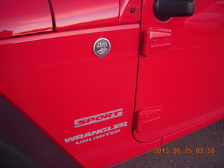 2 89r. `trail rated' medallion on my red Jeep