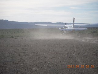 Sand Wash airstrip - RedTail airplane taking off