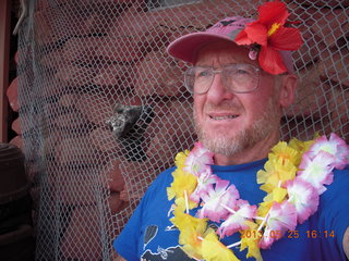 188 89r. Caveman Ranch - Adam with leis and hat flower