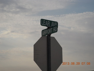 52 8av. Airport Road sign