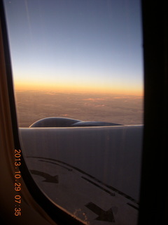 2 8ev. airliner window sunrise