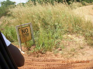 83 8f2. Uganda - drive to Murcheson Falls National Park - NO ENTRY sign