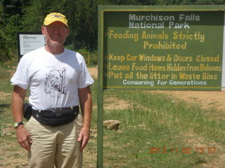 257 8f2. Uganda - Murcheson Falls National Park - Adam and sign