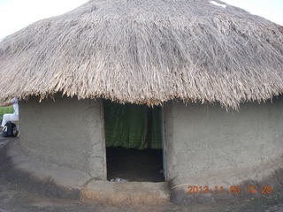 73 8f3. Uganda - eclipse site - host's hut home