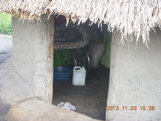 75 8f3. Uganda - eclipse site - host's hut home