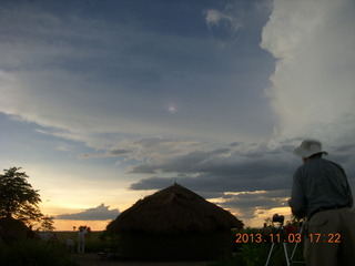 185 8f3. Uganda - eclipse site - total solar eclipse seen through a cloud