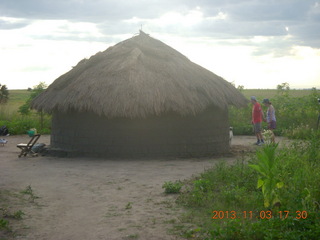 192 8f3. Uganda - eclipse site - hosts's hut home