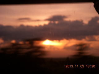 220 8f3. Uganda - driving back from eclipse - sunset