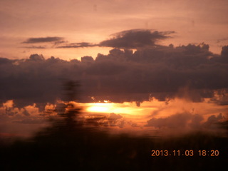 221 8f3. Uganda - driving back from eclipse - sunset