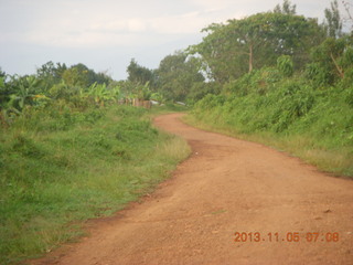 15 8f5. Uganda - farm resort run - main road