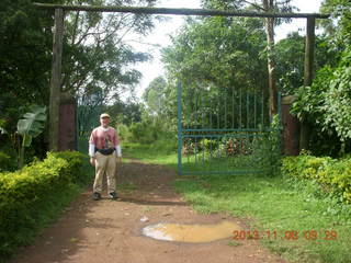 38 8f6. Uganda - Tooro Botanical Garden - gate and Adam
