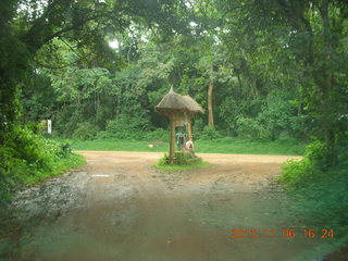 238 8f6. Uganda - Primate Lodge Kabile chimpanzee park - sign leaving