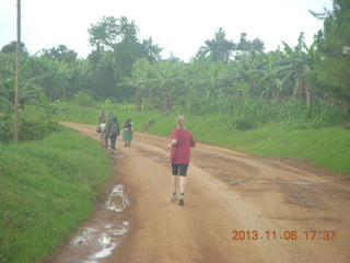 263 8f6. Uganda - drive back from chimpanzee park - another runner