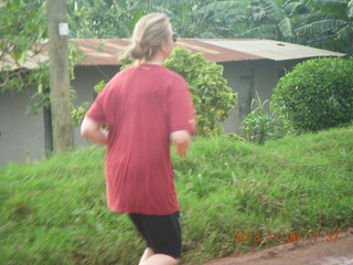 264 8f6. Uganda - drive back from chimpanzee park - another runner