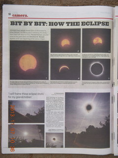 26 8f7. Uganda - drive back to Kampala - Daily Monitor newspaper on the eclipse