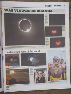 27 8f7. Uganda - drive back to Kampala - Daily Monitor newspaper on the eclipse