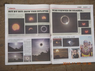 28 8f7. Uganda - drive back to Kampala - Daily Monitor newspaper on the eclipse