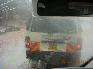 39 8f7. Uganda - drive back to Kampala - rain