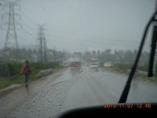 43 8f7. Uganda - drive back to Kampala - rain