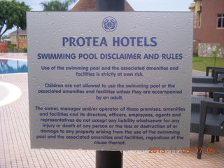 10 8f8. Uganda - Entebbe - Protea Hotel sign (too many lawyers)