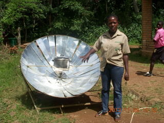 108 8f8. Uganda - Entebbe - Uganda Wildlife Education Center (UWEC) - solar cooker and our guide