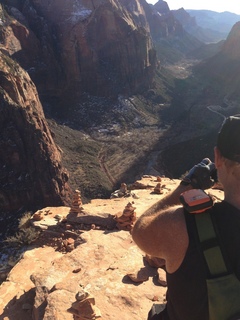 Zion National Park - Angels Landing hike - Adam taking a picture of the ledge at the top