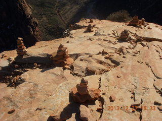 Zion National Park - Angels Landing hike - Brian leaning over taking a picture at the top