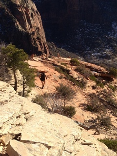 227 8gt. Zion National Park - Angels Landing hike - at the top - Adam hiking to the ledge