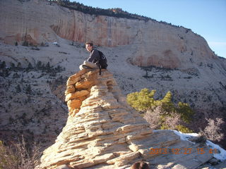 Zion National Park - Angels Landing hike - at the top - Brian sitting on a hill