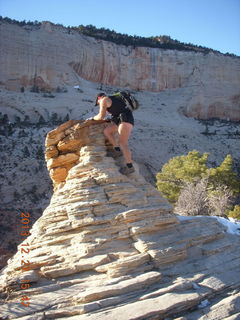 Zion National Park - Angels Landing hike - at the top - Adam climbing a hilll