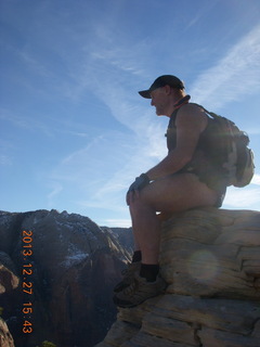 245 8gt. Zion National Park - Angels Landing hike - at the top - Adam sitting on a hill