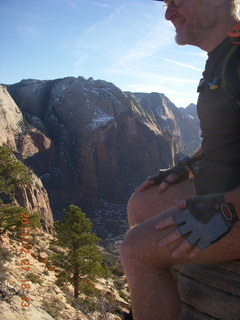 246 8gt. Zion National Park - Angels Landing hike - at the top - Adam sitting on a hill