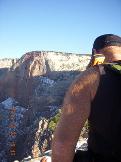 247 8gt. Zion National Park - Angels Landing hike - at the top - Adam sitting on a hill