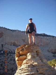 Zion National Park - Angels Landing hike - at the top - Adam climbing a hill