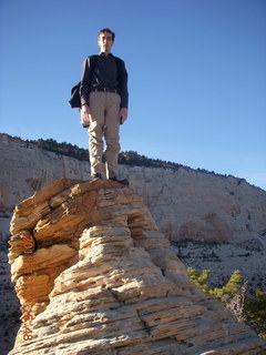 Zion National Park - Angels Landing hike - at the top - Adam climbing a hilll