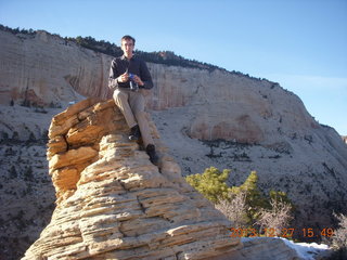 Zion National Park - Angels Landing hike - at the top - Adam sitting on a hill
