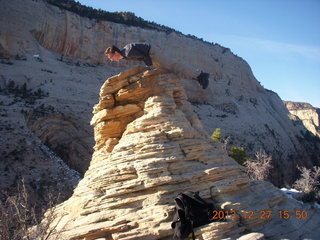 261 8gt. Zion National Park - Angels Landing hike - at the top - Brian balanced on a hill