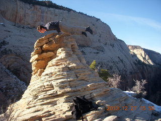 262 8gt. Zion National Park - Angels Landing hike - at the top - Brian balanced on a hill