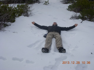 22 8gu. Zion National Park - Cable Mountain hike - Brian making a snow angel