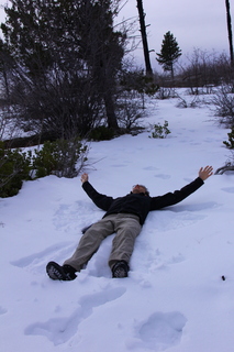 225 8gu. Zion National Park - Cable Mountain hike - Brian making a snow angel